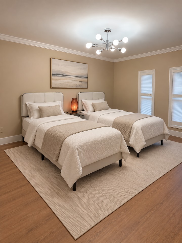 Bedroom 2 with 2 memory foam Twin XL beds and bamboo sheets. This room has its own bathroom with walk in shower. This room has a 43” TV.