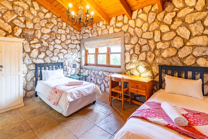 view from bedroom 3 door towards window with two single beds
