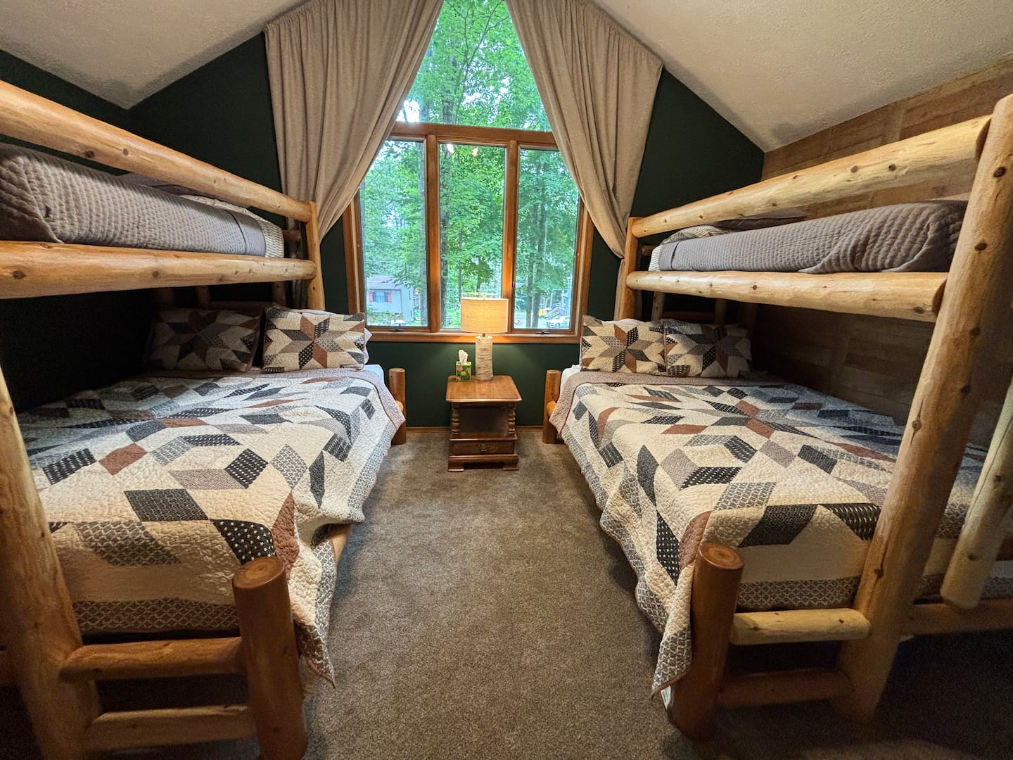 Bunk room with log-frame beds