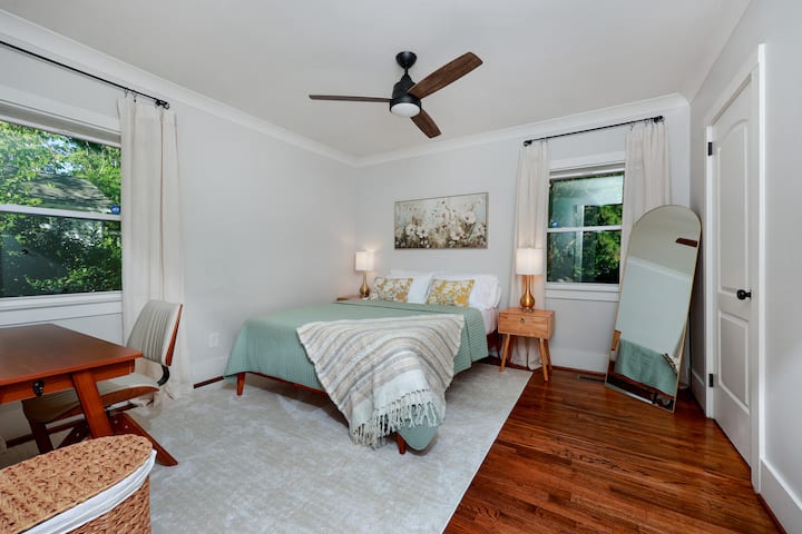 Quiet workspace bedroom with a queen bed, memory foam mattress, firm and medium firm pillows, a dedicated desk for remote work, and a sound machine for a restful sleep.

A luggage rack is also located in the closet.