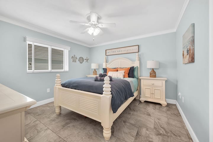The second bedroom with the queen bed