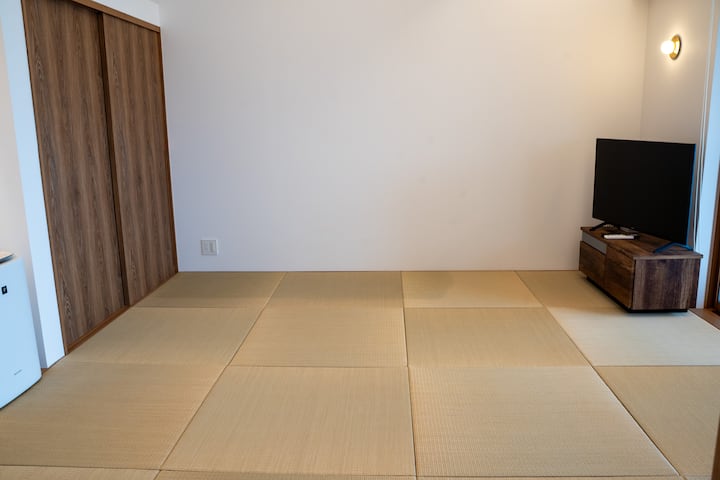 There are 4 sets of futons in the closet in the Japanese-style room.