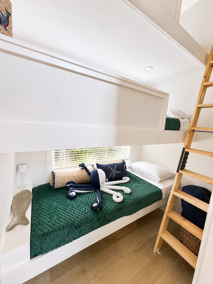 1 bunk bed with 3 twin beds