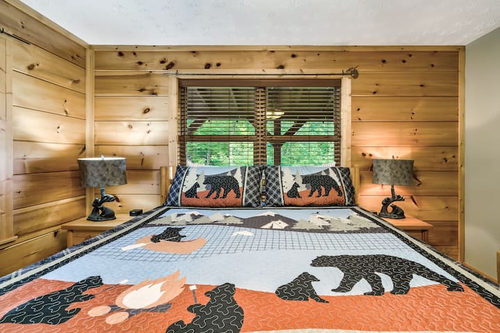 Retreat to the main-level king suite featuring a comfortable king bed, Smart TV, and private ensuite bathroom with a relaxing Jacuzzi soaking tub.
