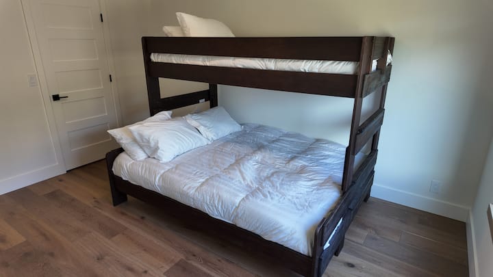 Upstairs twin XL over queen bunk bed. Jack and jill bathroom attached. Oversized closet as well.