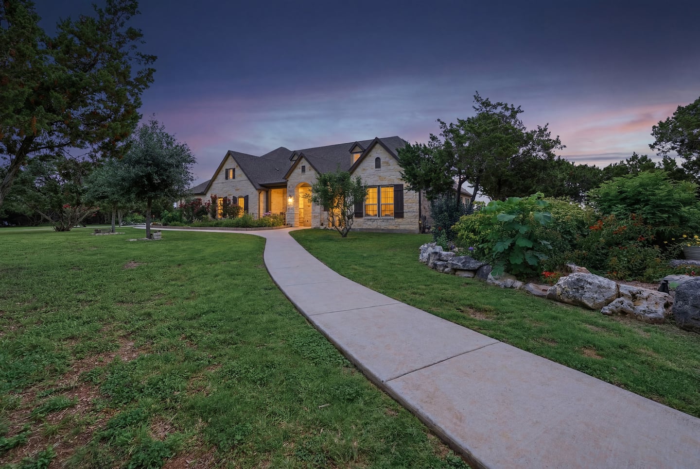 The Pebble Farms farmhouse at dusk