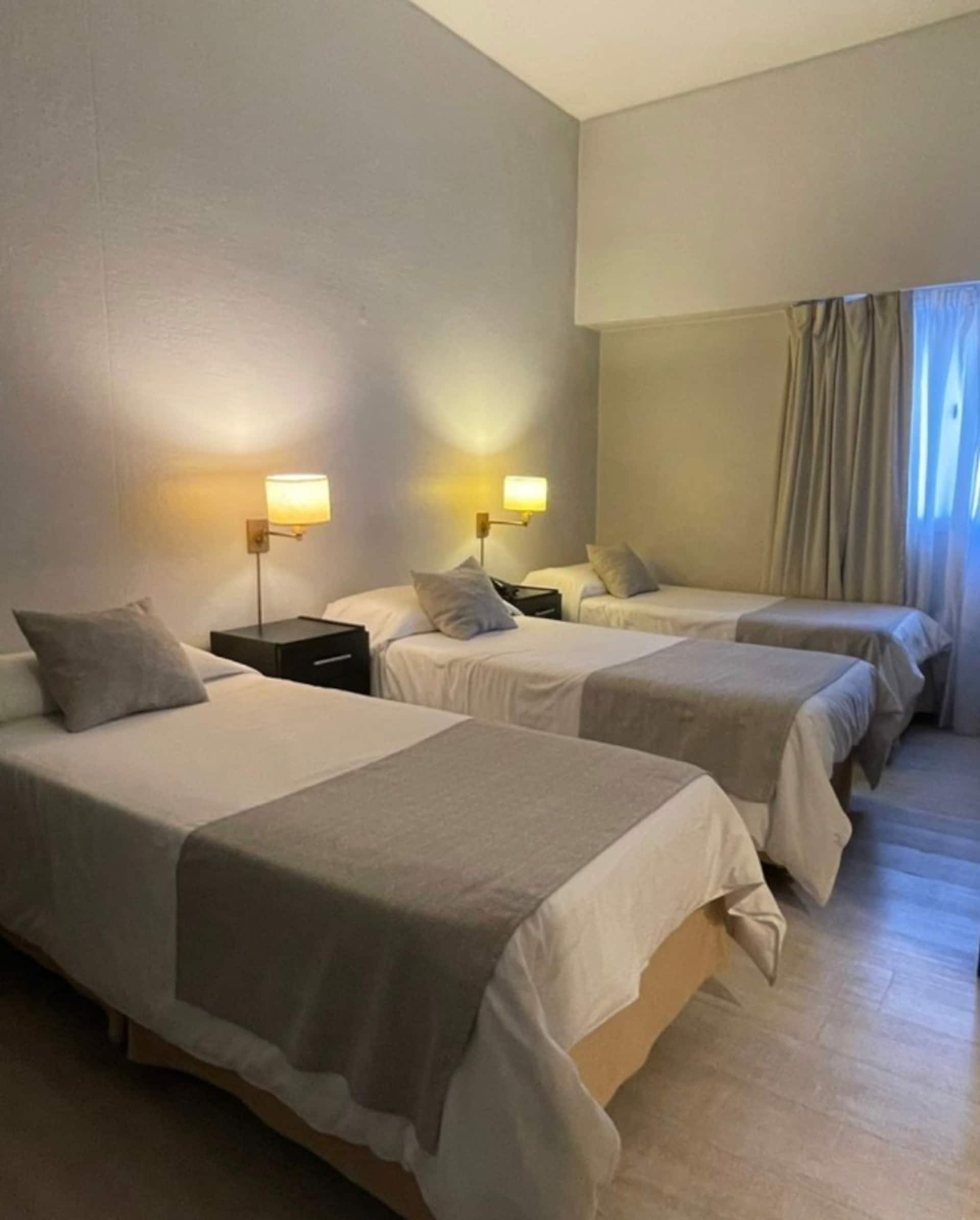 Quarto de hotel para três