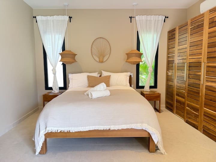 Bedroom 2: Queen bed and private bathroom