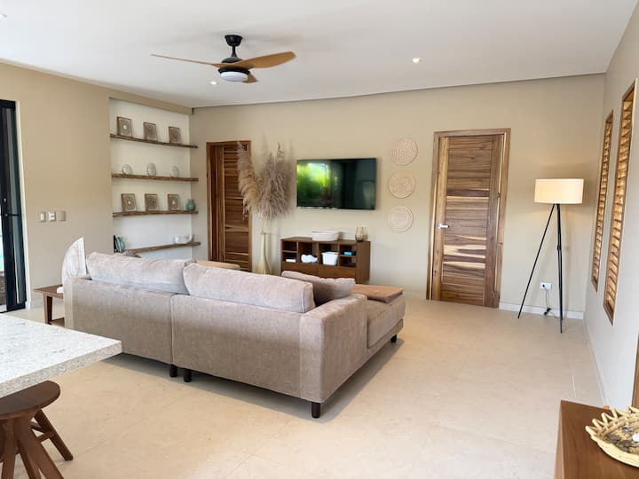 Air-conditioned living room, Smart TV and sofa bed