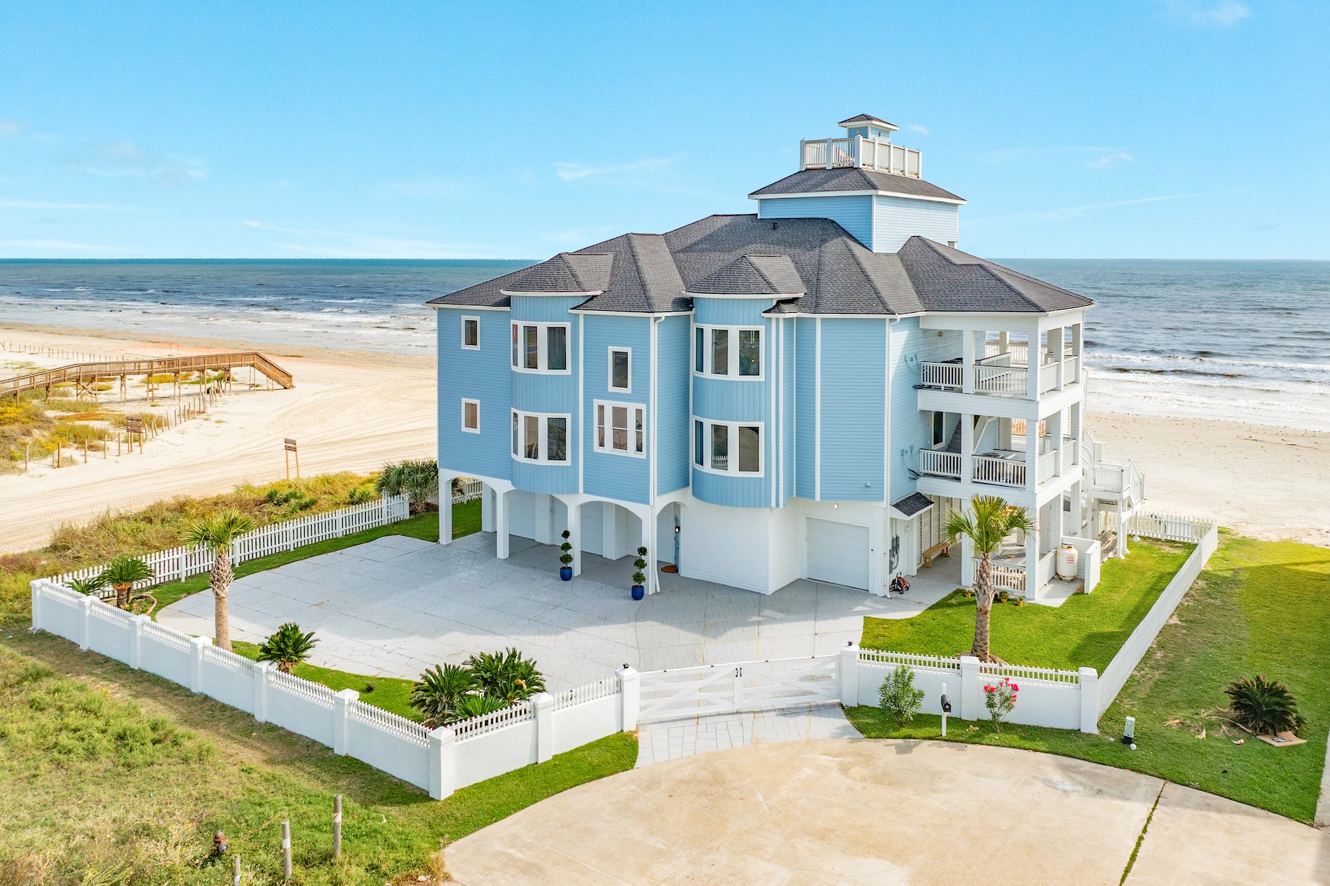 Beachfront retreat estate at sunset