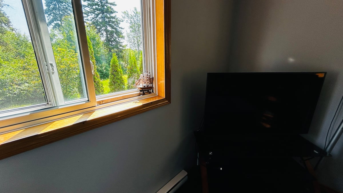 Big picture window beside the TV