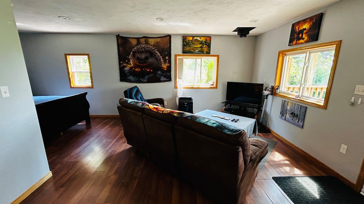Hardwood floors and comfy seating