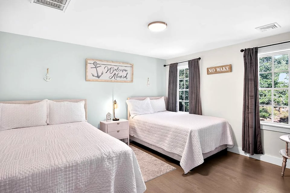Bedroom with two full beds