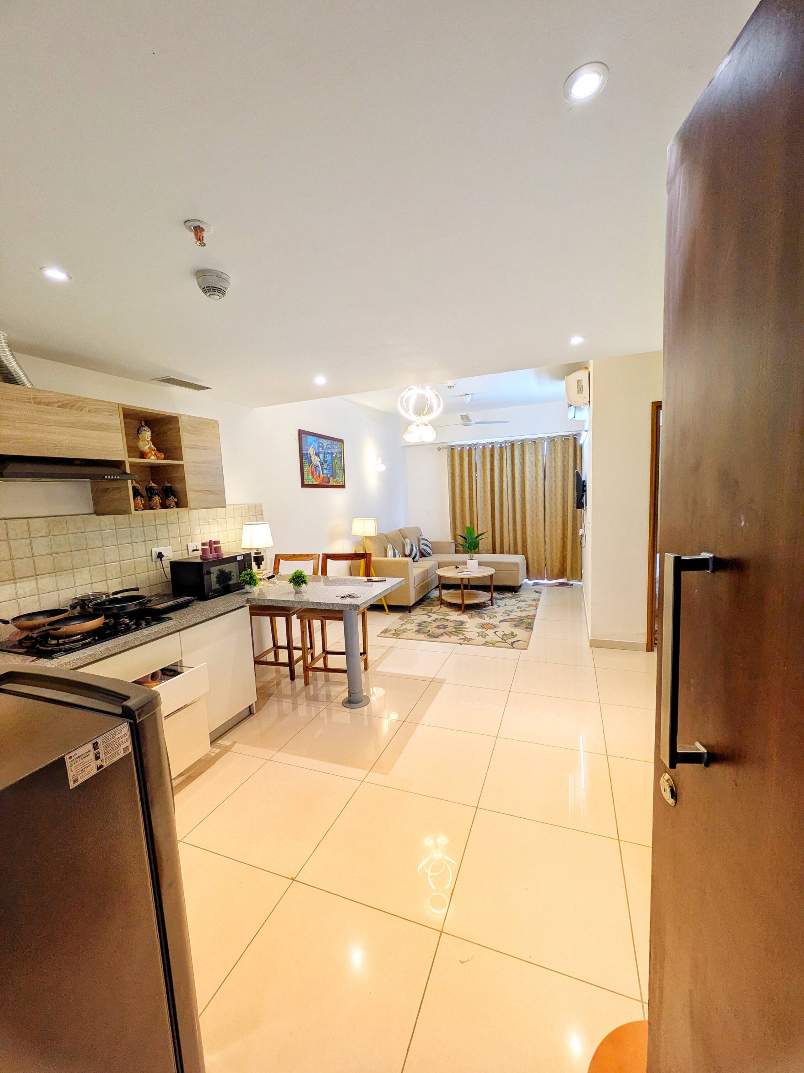 Open-plan layout seen from the kitchen towards the living room
