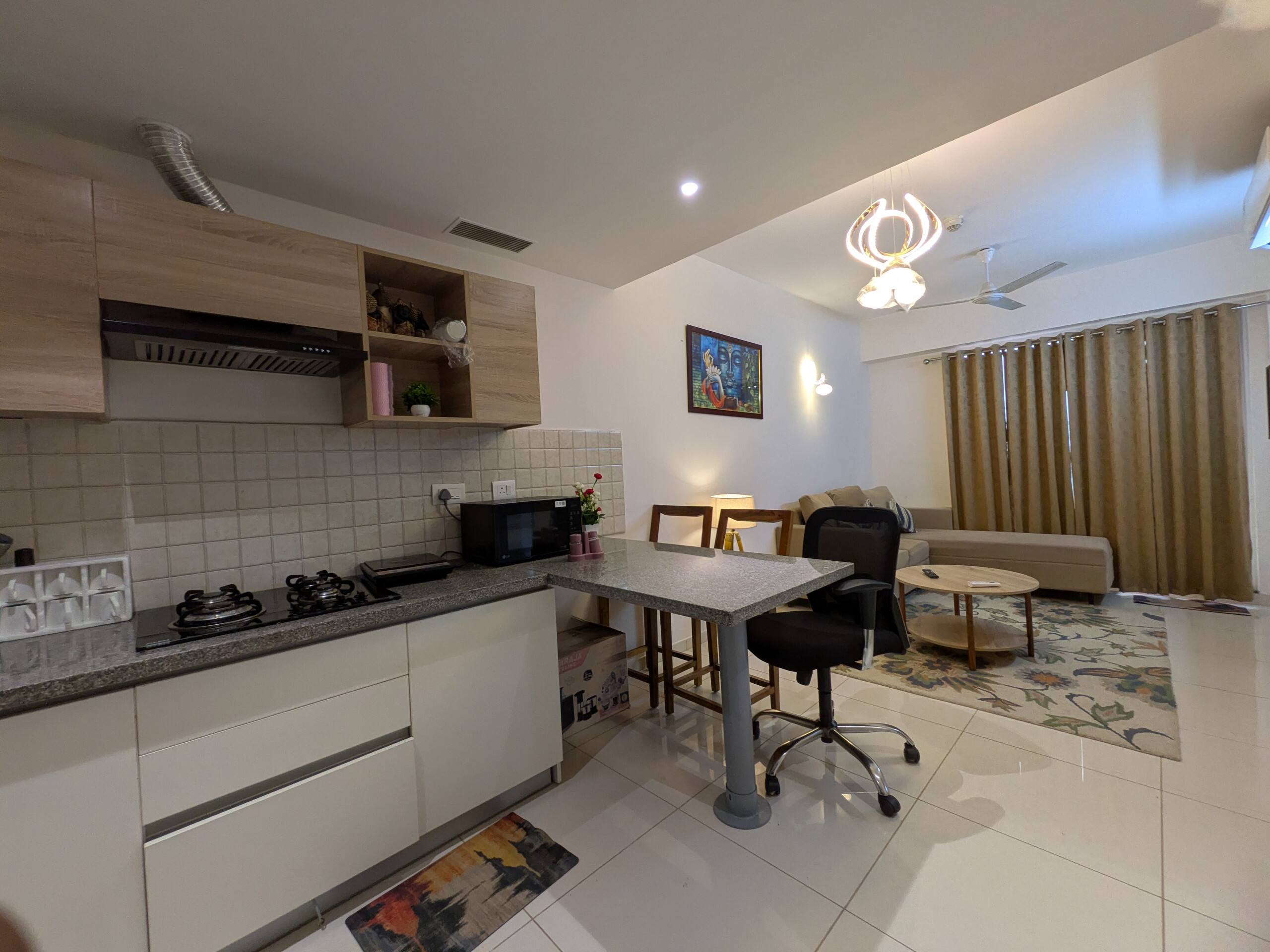 Kitchen opening onto the dining and living area