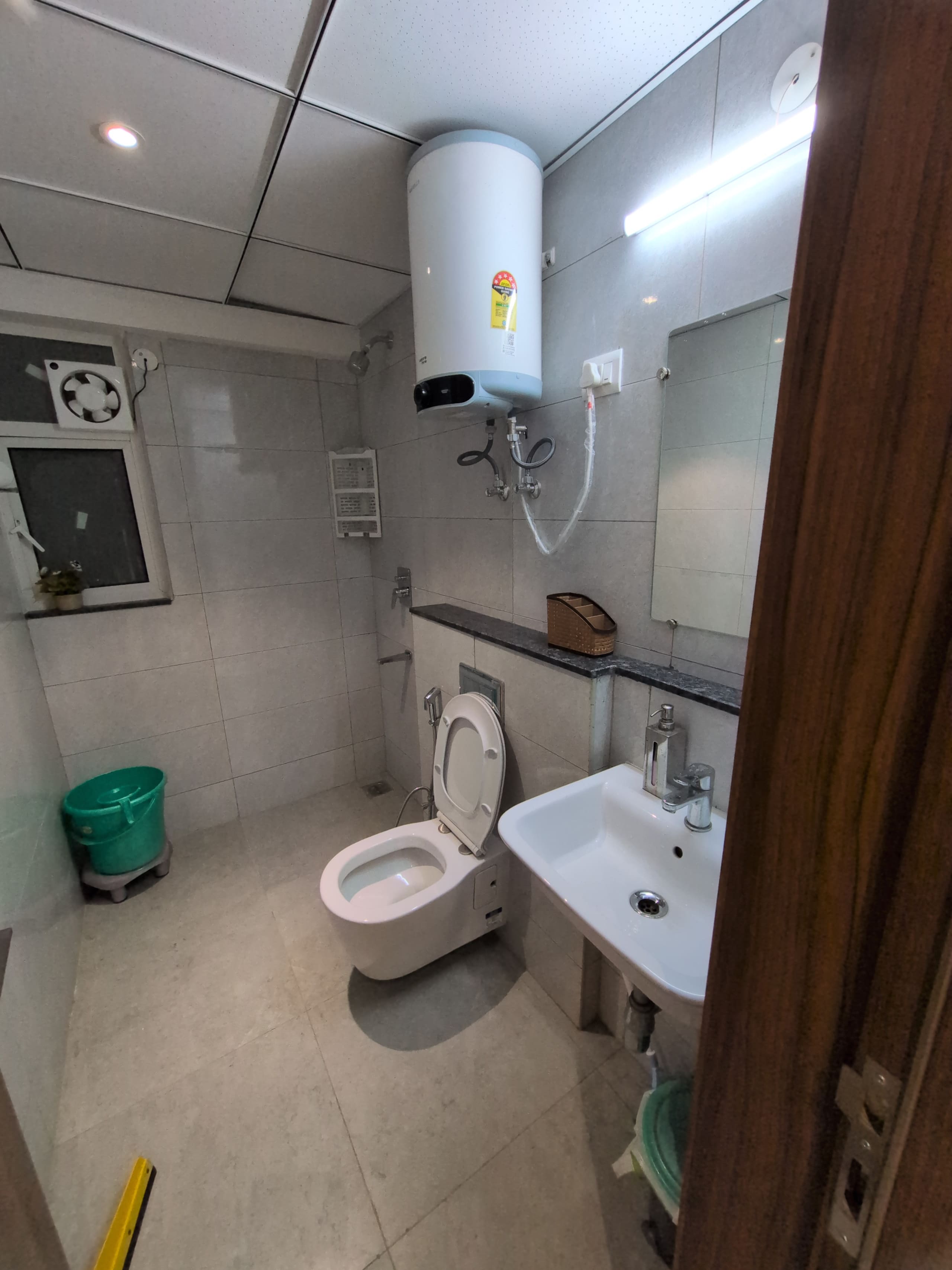 Bathroom two with WC, basin and geyser