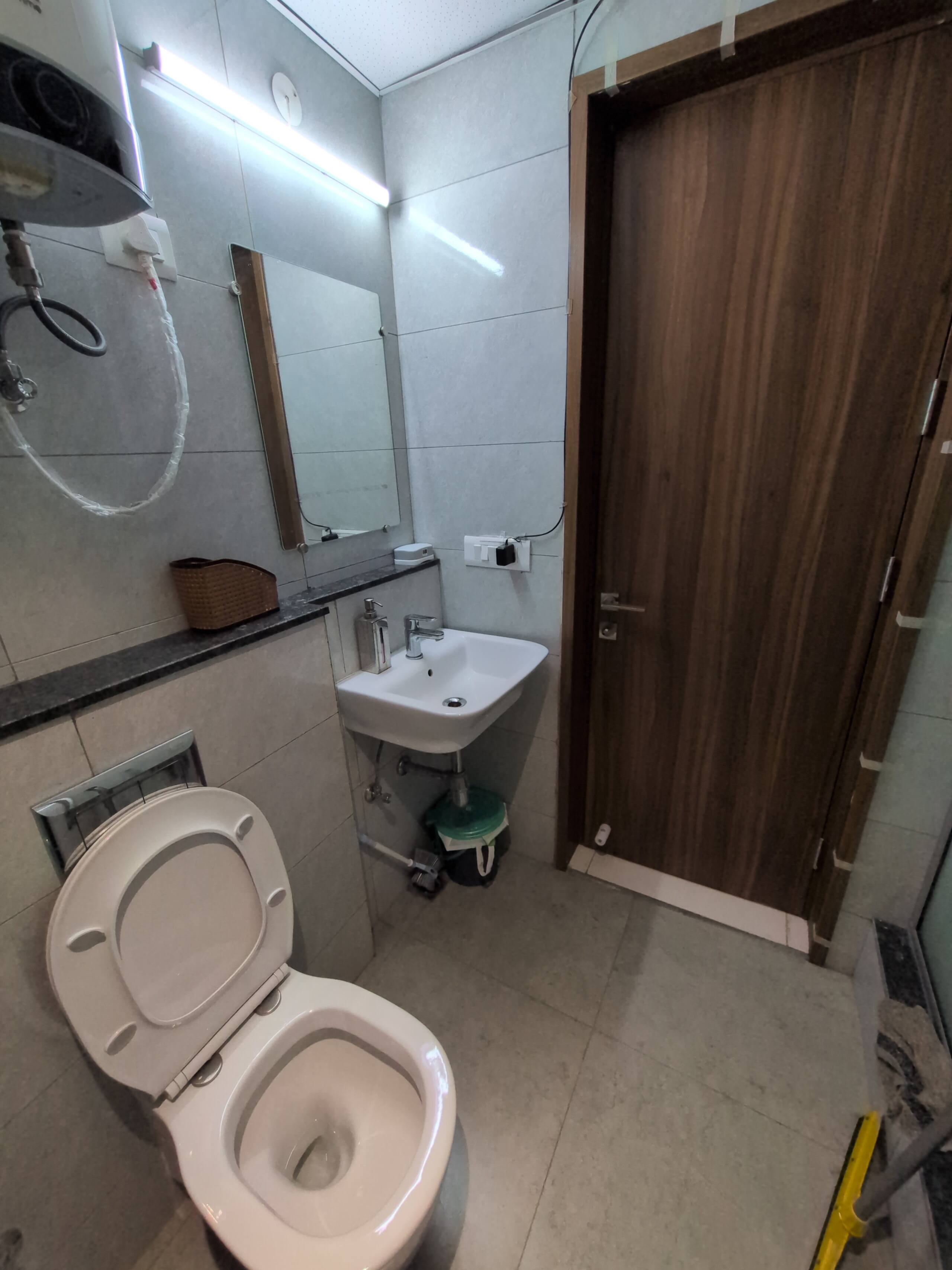 Basin beside the bathroom door