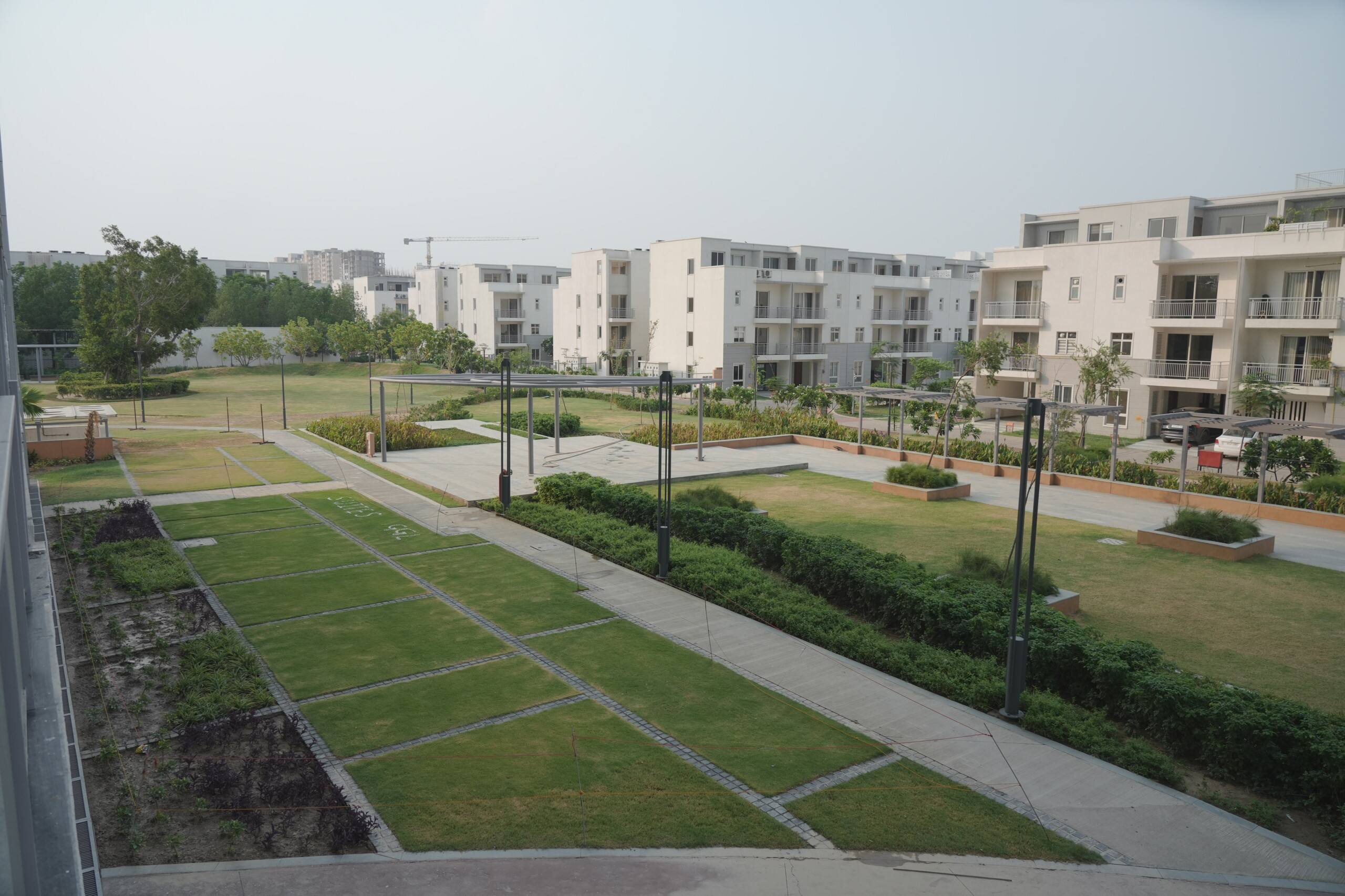 Landscaped gardens and walking paths in the township