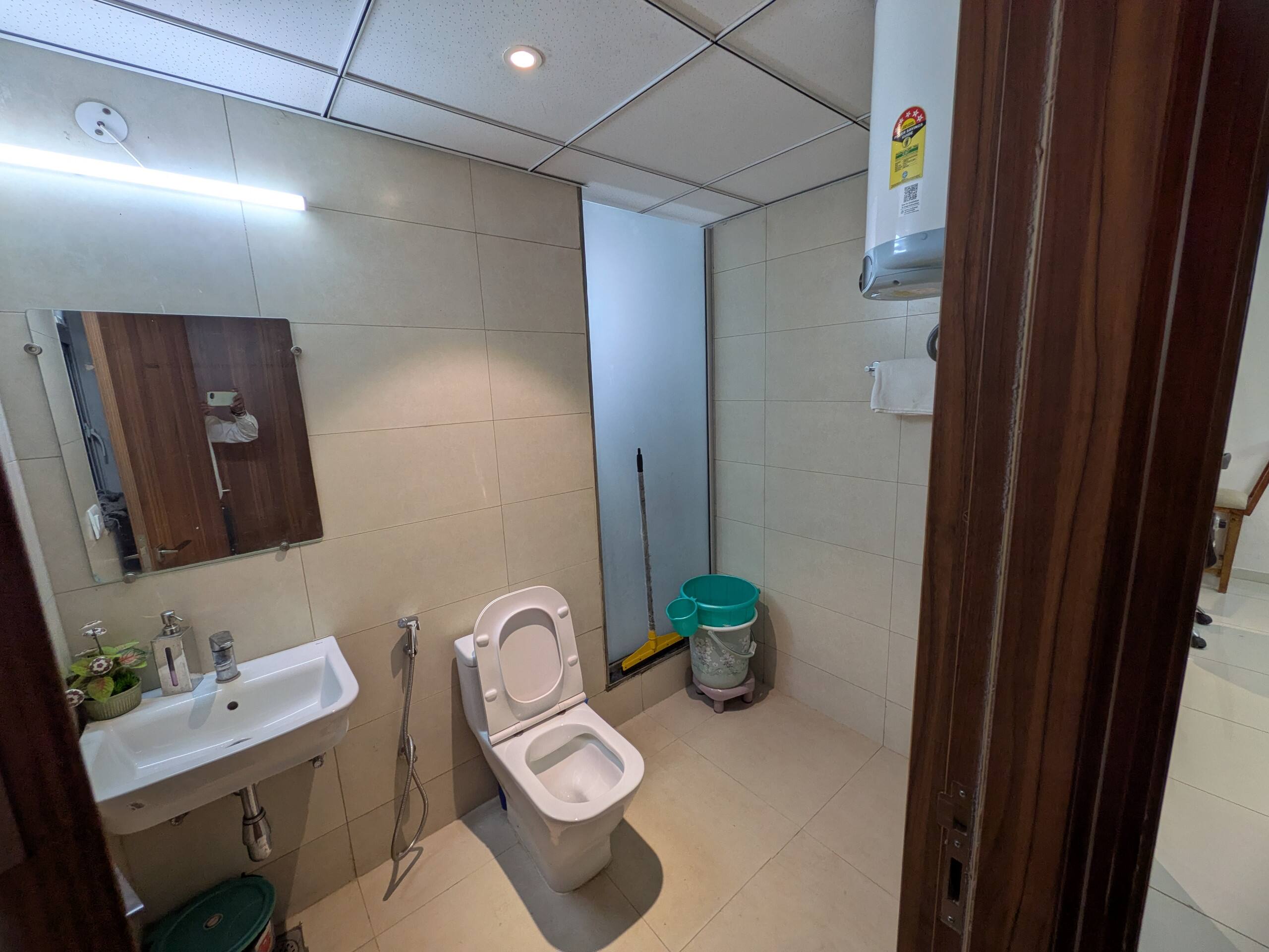Mirror, basin and WC
