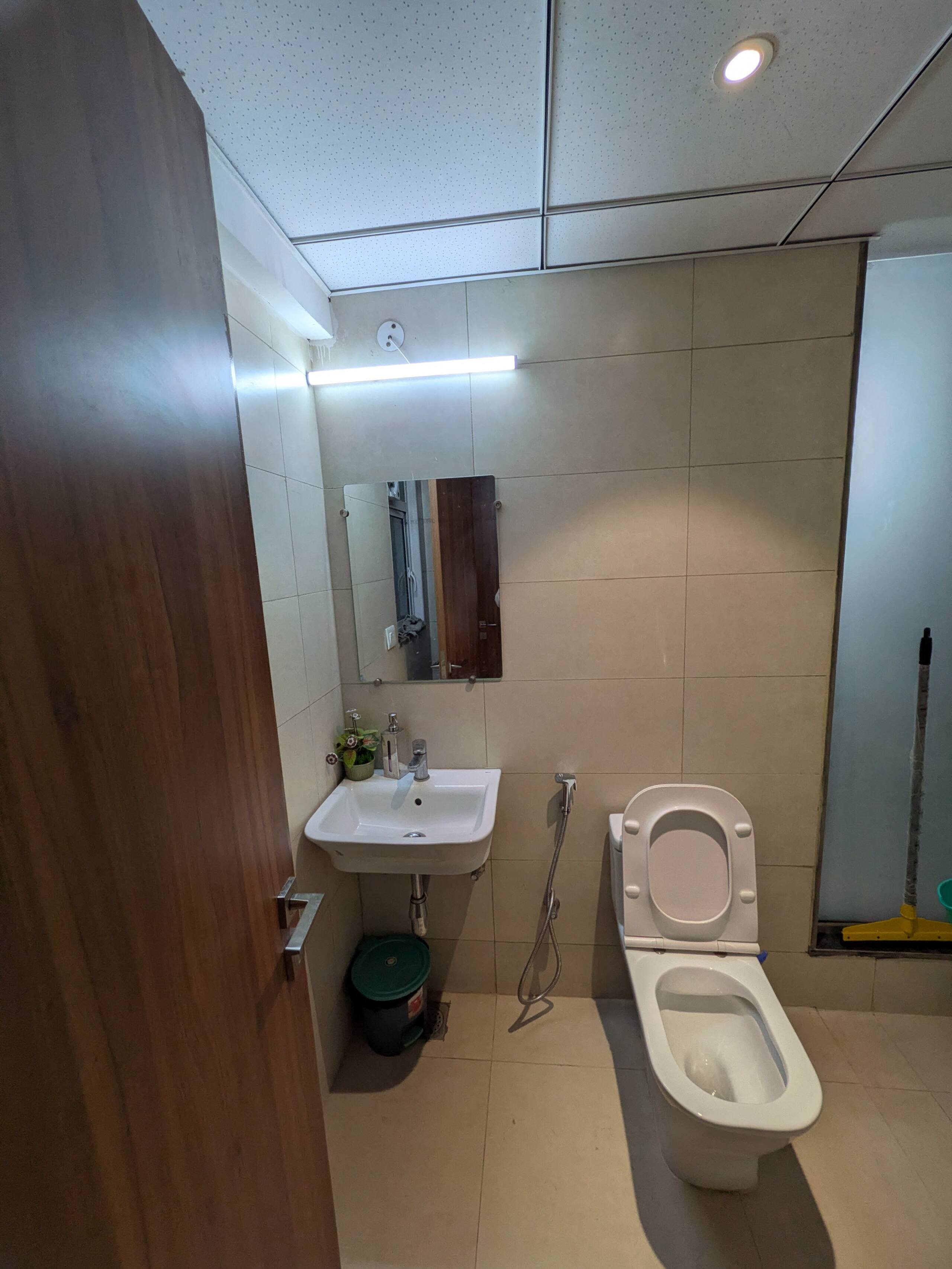 Basin, mirror and WC