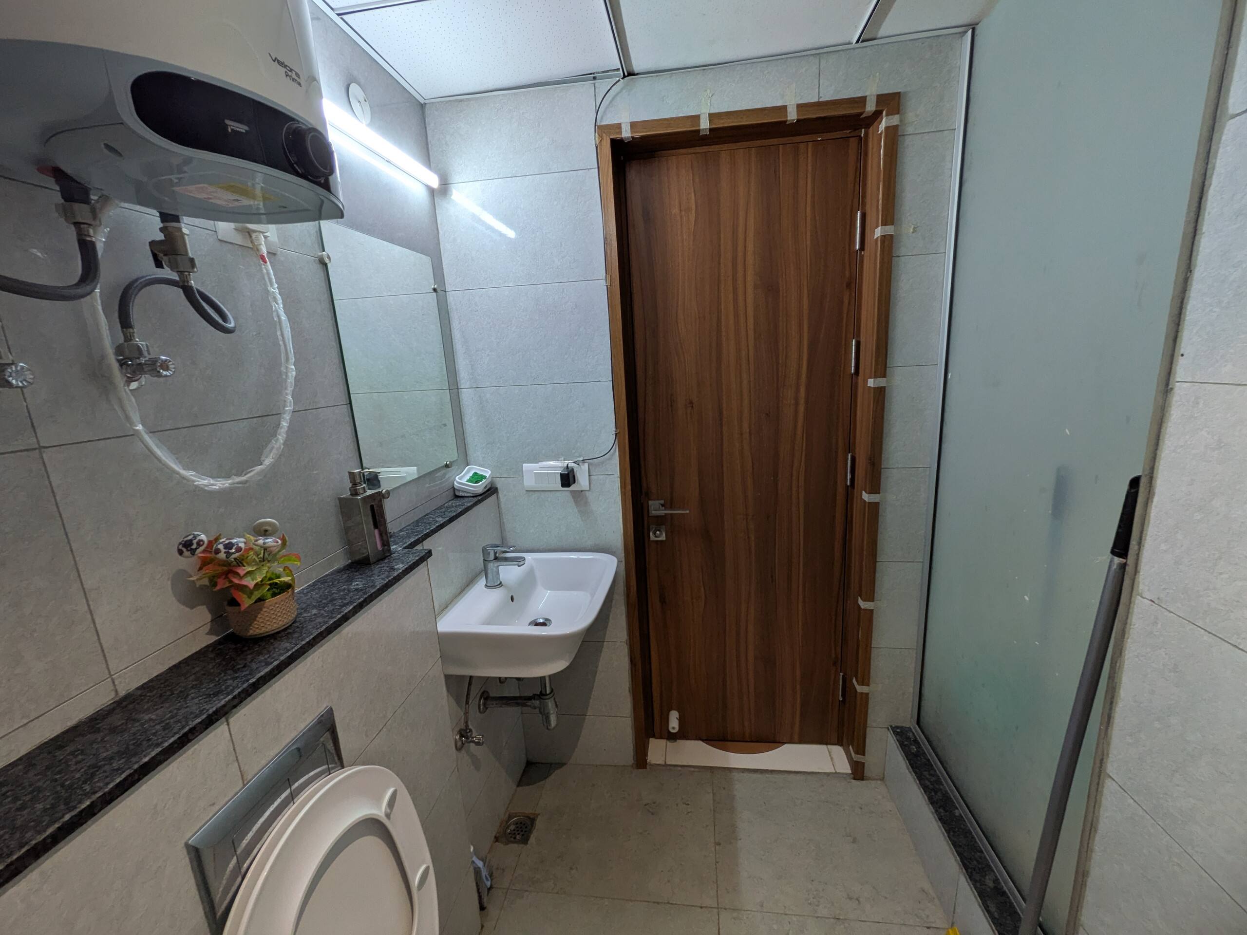 Bathroom with glass shower partition