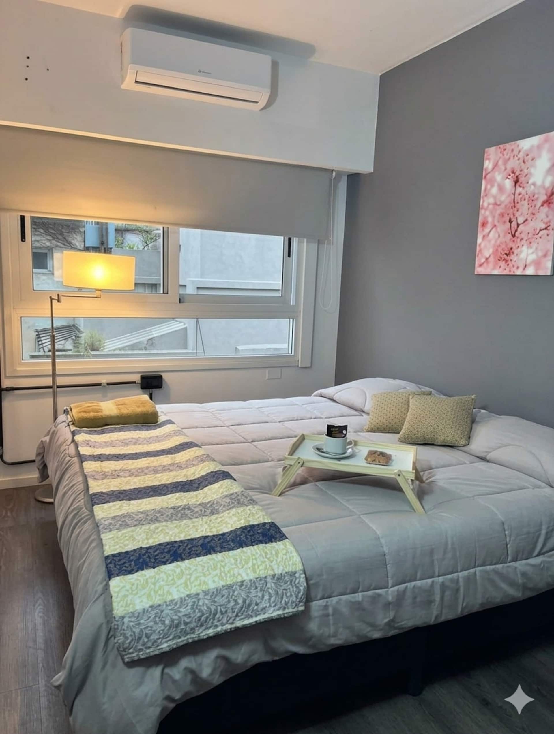 1 dormitorio con aire acondicionado
