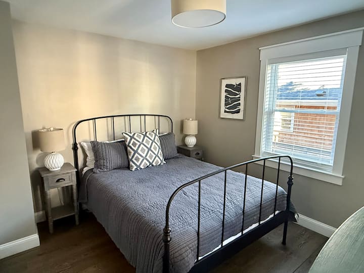 Bedroom 2: Queen Bed, closet and dresser.