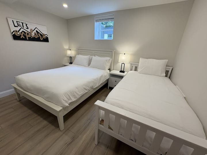 Big House: Basement Front Bedroom with house laundry located right outside