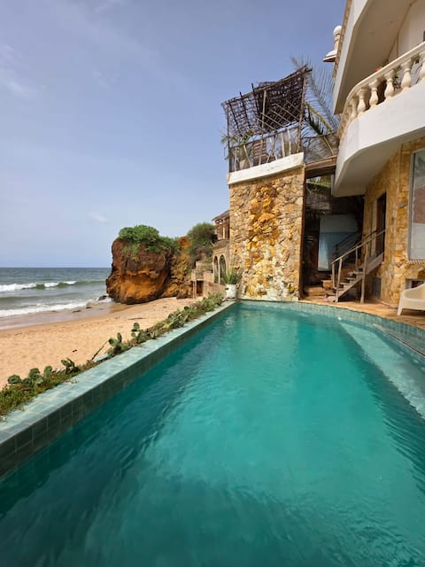 Beachfront cottage with a private pool