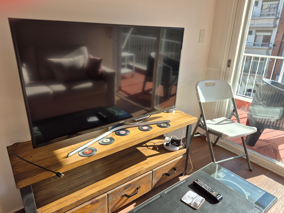 Departamento con terraza en L