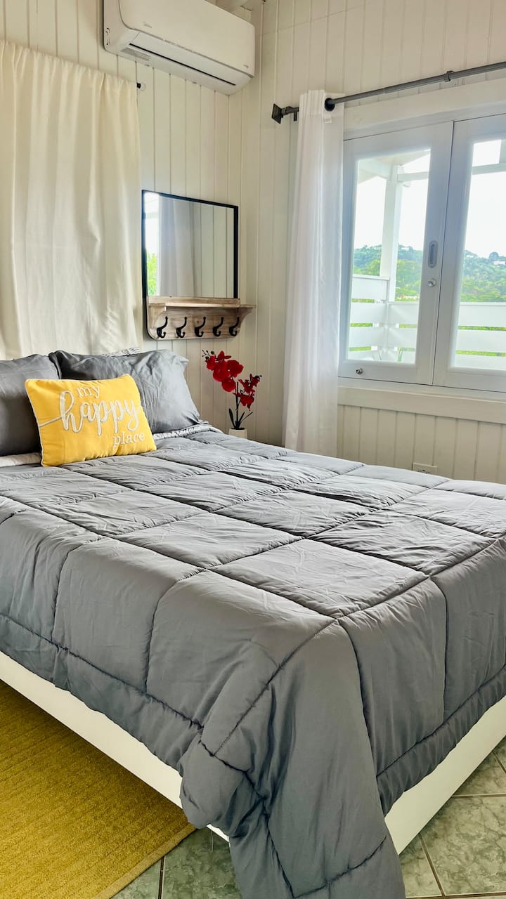 Bedroom number two has bifold windows a beautiful view and plenty of sunlight