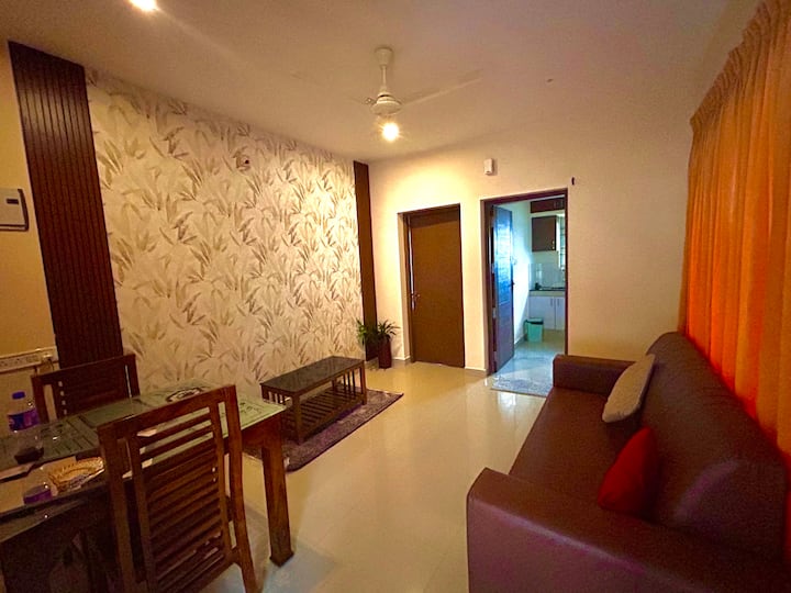 Orchid Homes | Cozy Retreat| 1bhk Near Lulu Mall - Kerala