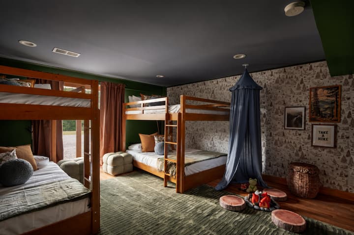 A playful bunk room gives kids and friends their own cozy space to settle in for the night.