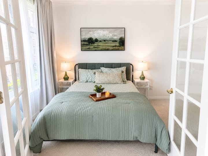 Comfortable queen bedroom—ideal for a second couple, friends or family.