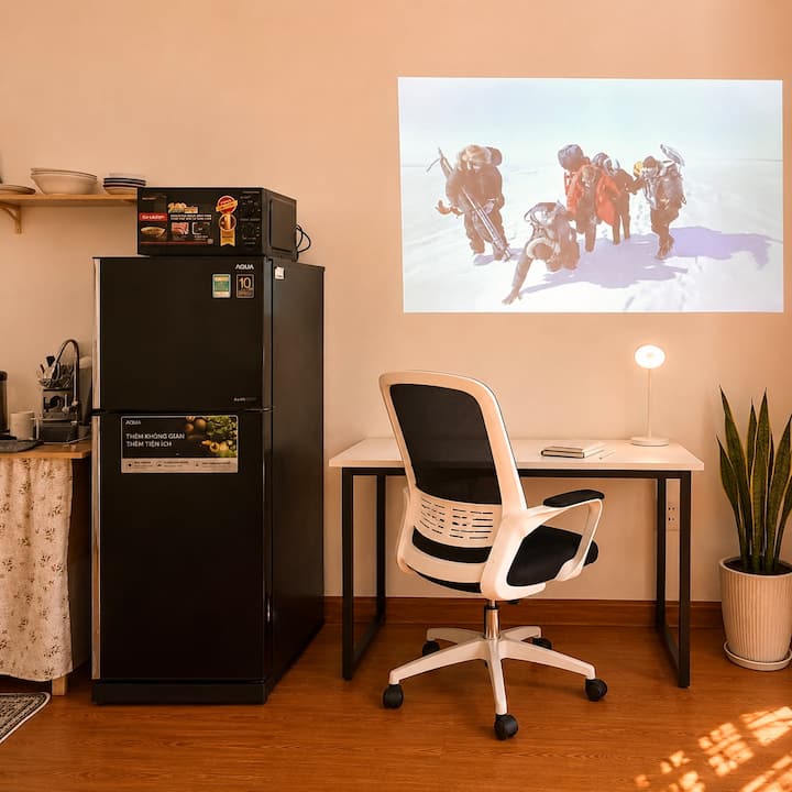 Workspace evidence from Sunny Balcony Studio•Projector•5’ to My Khe Beach