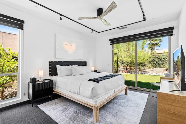 King bedroom with natural light and direct access to the outdoors