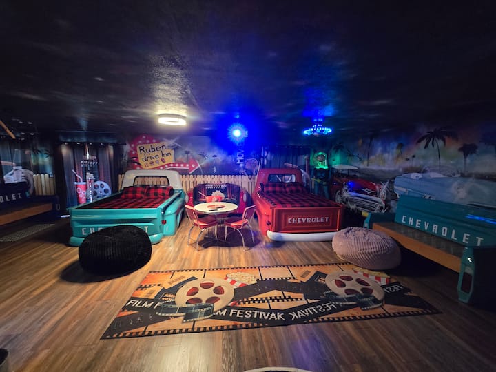 2 custom Chevy beds with full bath and projector to watch movies,games,exc