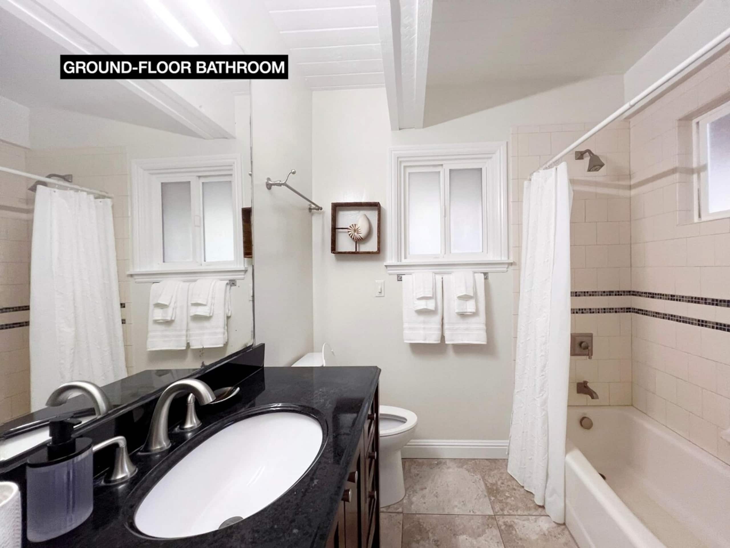 NEW 4BR Oceanfront Home with Hot Tub & Theatre - Photo 26