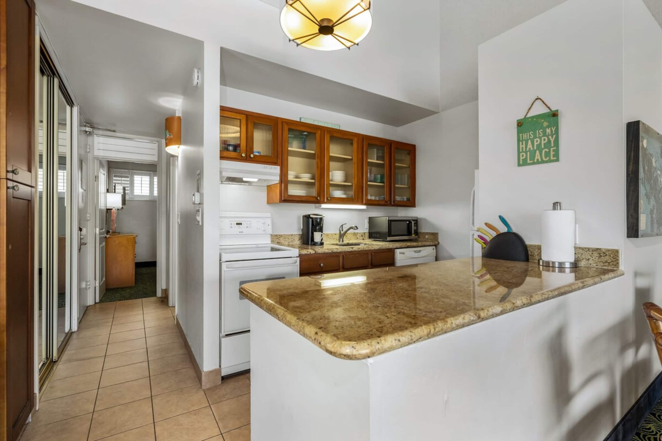 Napili Bay beachfront condo w/ pool views - Photo 13