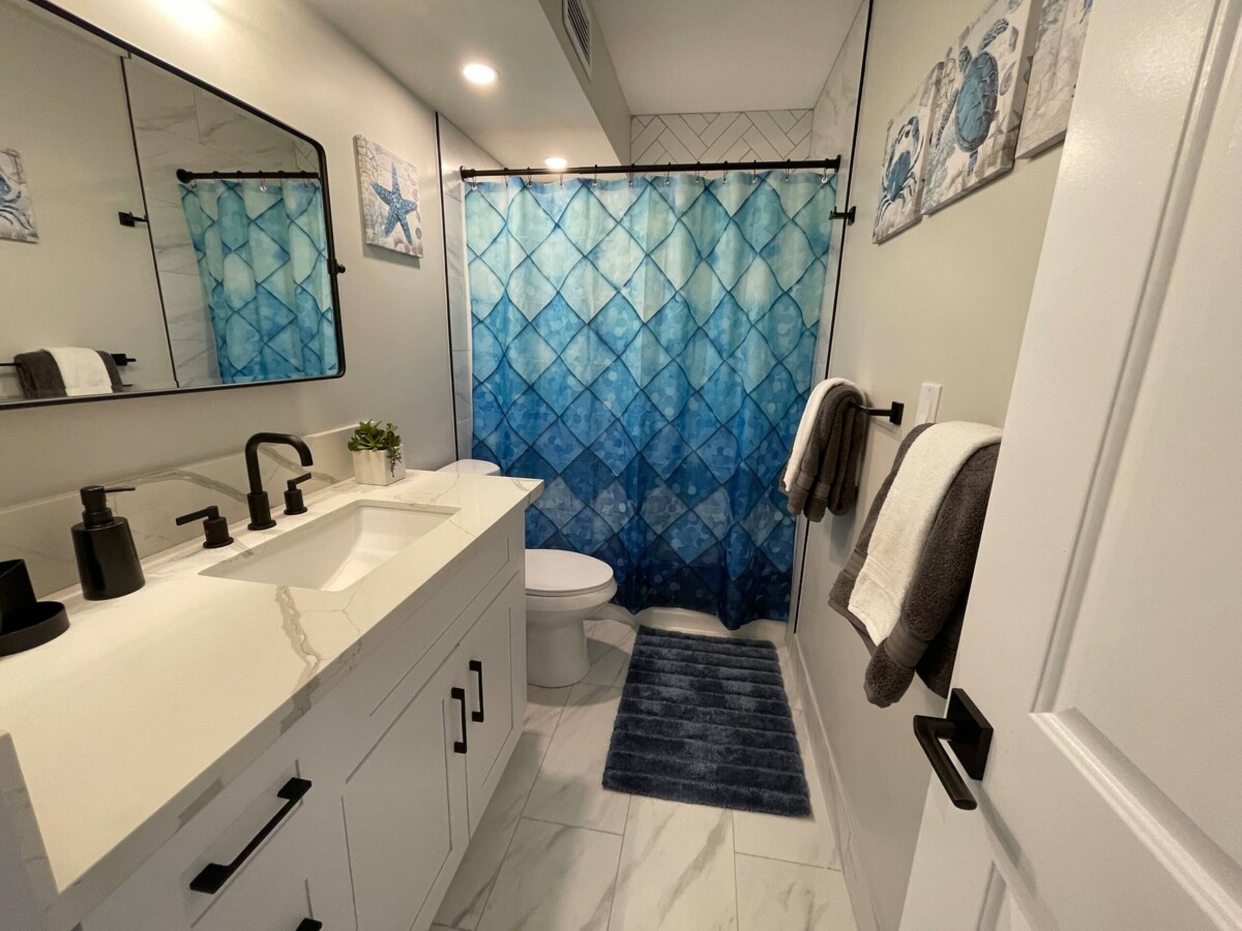 Deal Beautiful Renovated Unit, Partial Ocean View - Photo 15