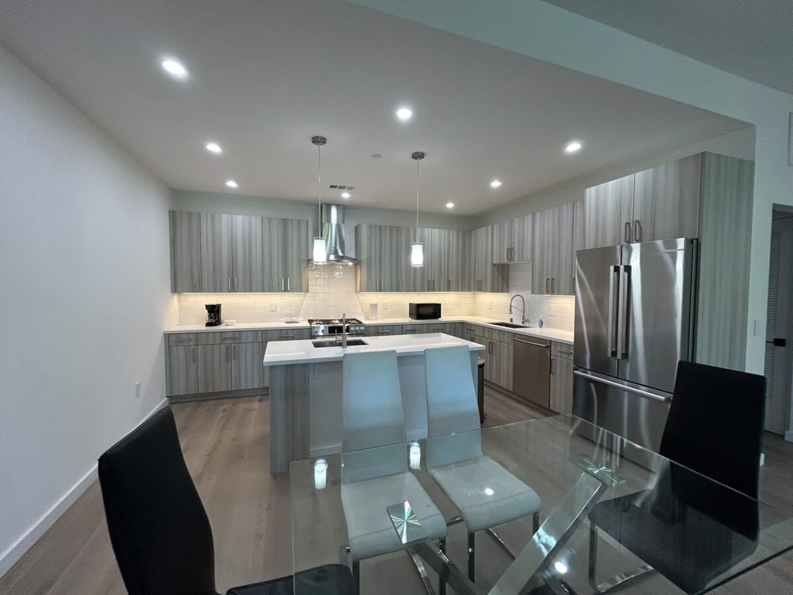 Sleek New Townhouse Balcony & Private Garage - Photo 4