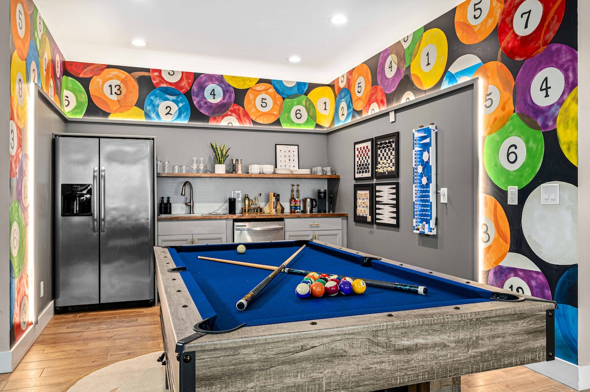 Pool table game room at Lux Resort