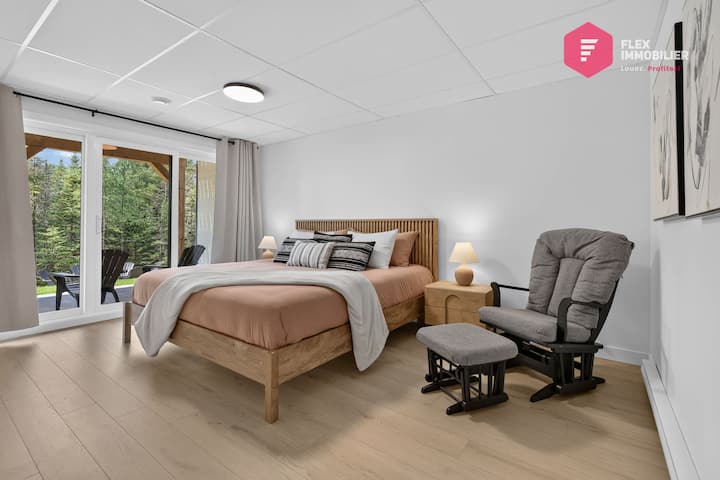 Comfortable bedroom #3 on the garden level with a king-size bed and a double wardrobe