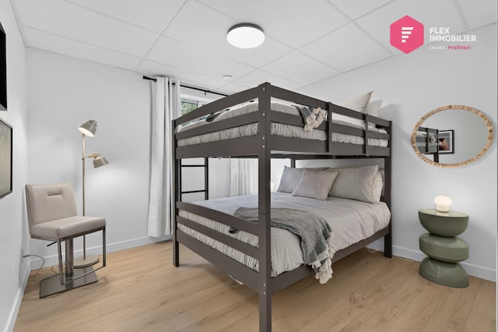 Comfortable bedroom #4 in the basement with 2 double beds and a double wardrobe