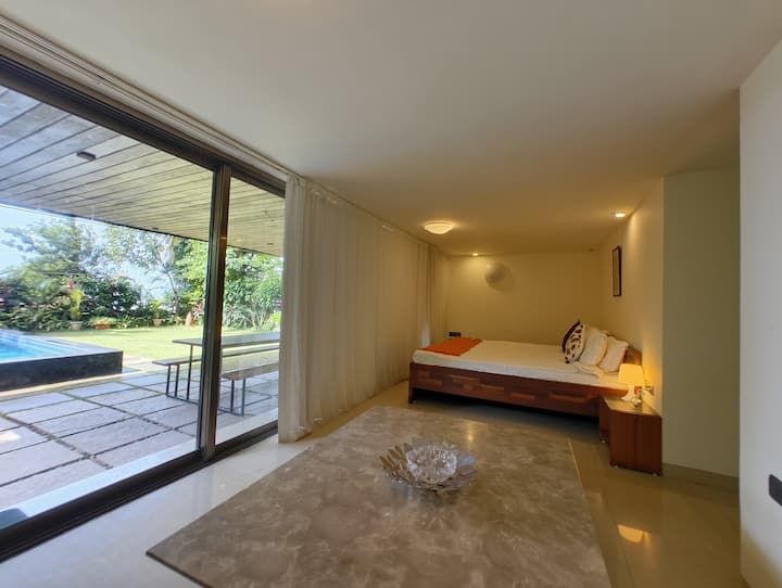 This is on Lower Ground Floor open to Pool and Lawn