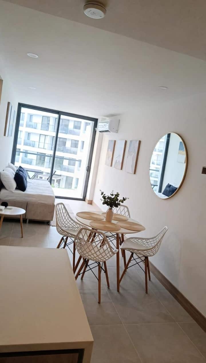 Open-concept living room with single bed and trundle