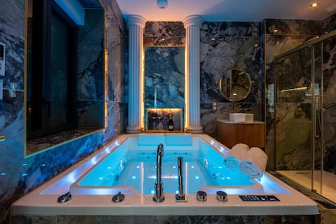 Popular Airbnb listing: Golden Blue Suite • Hot tub • Home theater • Terrace in Malakoff Saint Donatien