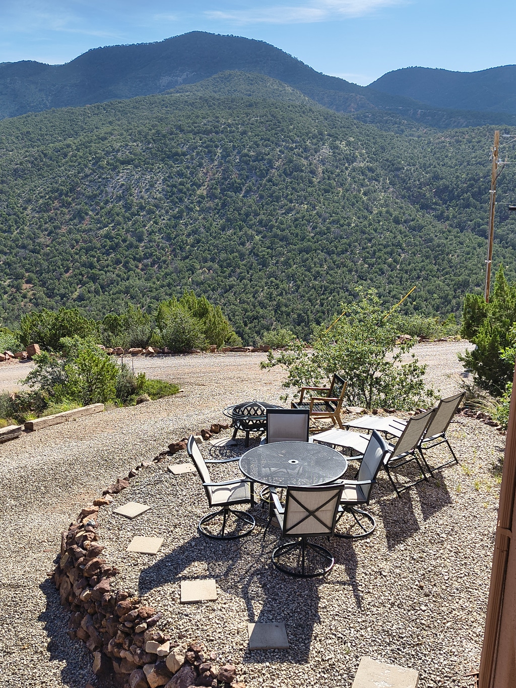 Wood-burning fire pit under the mountain sky