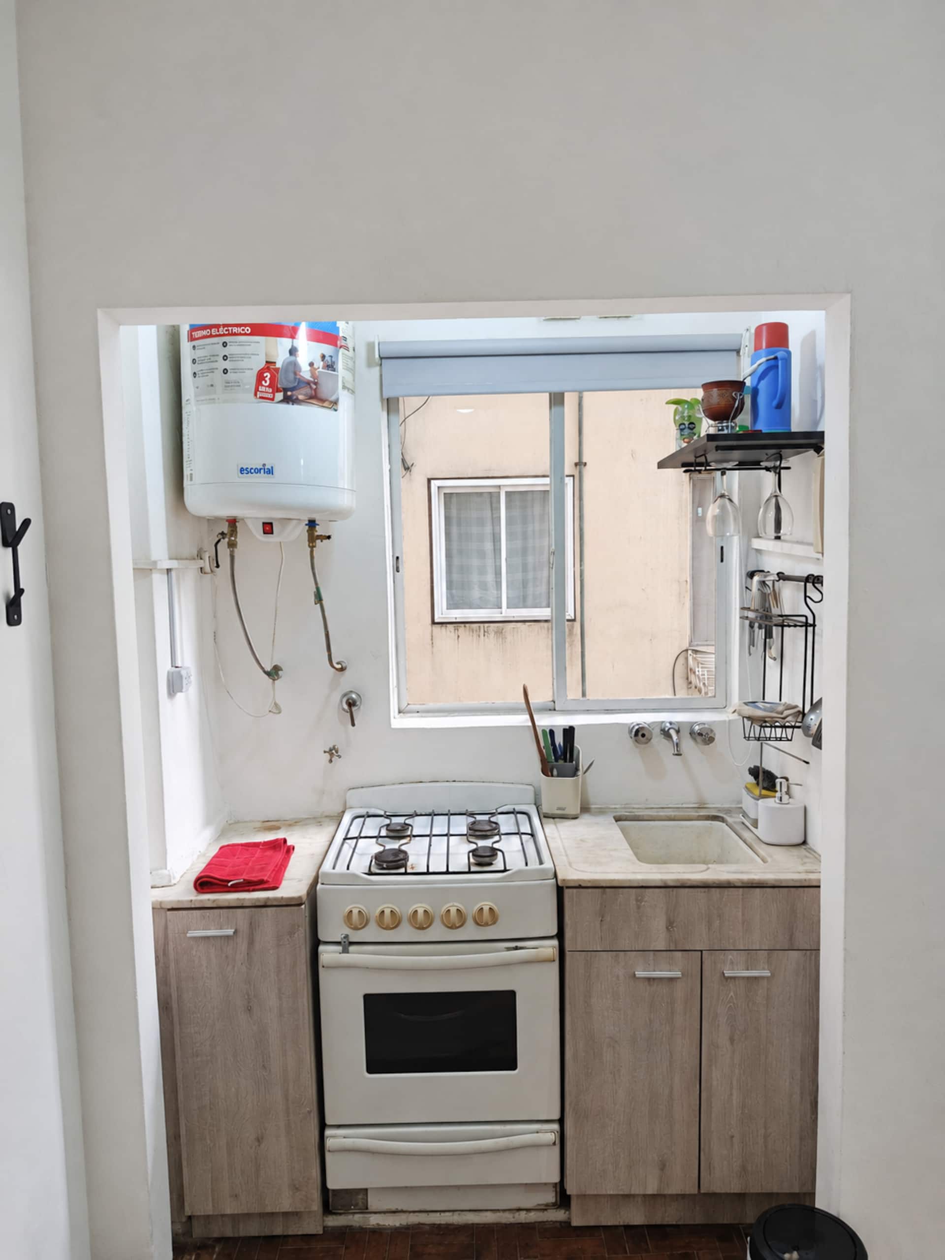 Studio con cocina a gas