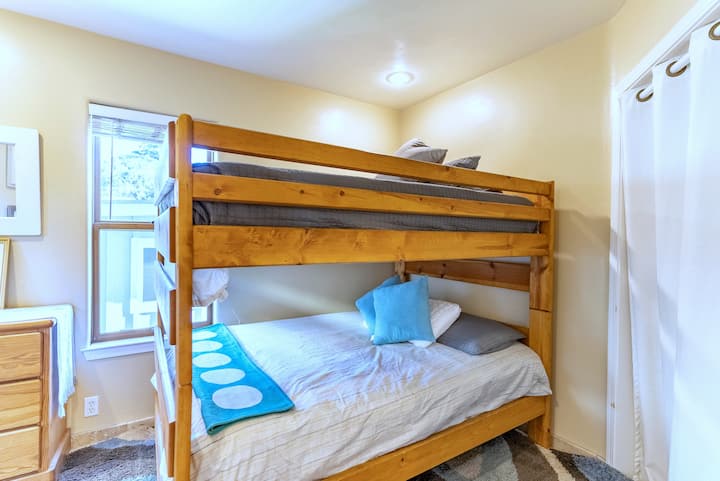 Guest bedroom with two queen beds in a bunk format